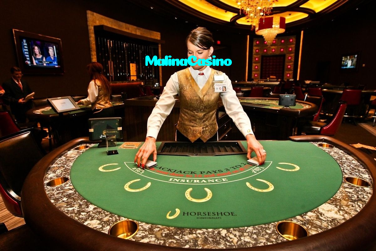 MalinaCasino casino presented on mobile device in Pakistan with slots and live games